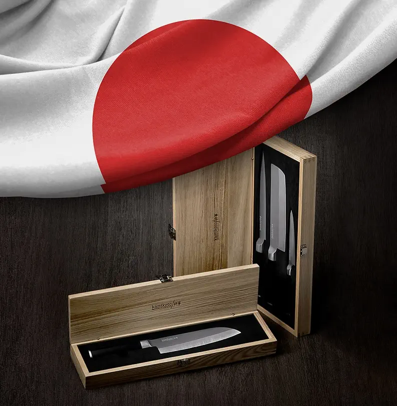 Two sets of Japanese steel Knives covered with the Japanese flag. Photo Manipulation, Image Editing.