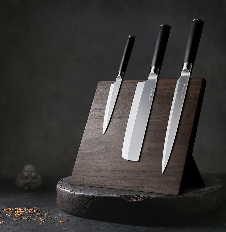 A set of Japanese Kitchen Knives on a Wooden Wtand. Product post-production.