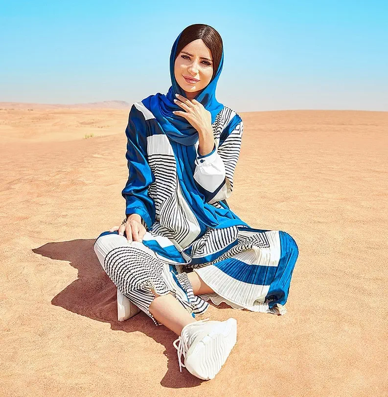 Beautiful Arab woman in the Arabian desert. Beauty Retouching.